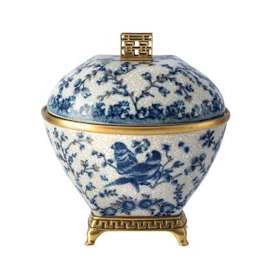 China Disposable Luxury Bone China Hand Painted Blue And White Fruit Bowl With Brass Handle Vintage Exquisite Classic Decorative Vase for sale