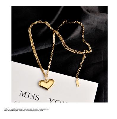 China TONGLING TRENDY Heart Necklace Love Knot Side Pendant For Women Gold Filled Stainless Steel Necklaces for sale