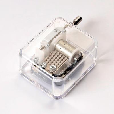 China 2020 Custom Gift Acrylic Cheap Transparent Hand Crank Music Box for sale