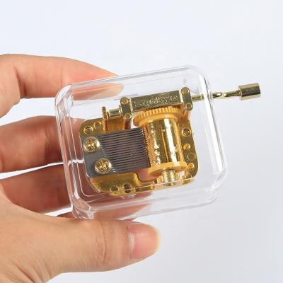 China Personalized Acrylic Transparent Music Box Keepsake Music Box for sale