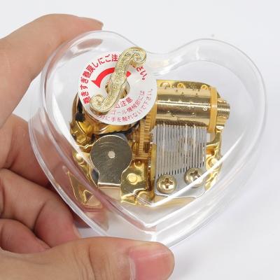 China Valentine's Day Gift Unique Acrylic Music Box Love Shaped Music Box for sale