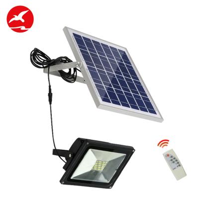 China Garden Dimmable Automatically On 10 20 30 50 Waterproof Outdoor Remote Control 100W Solar Led Spotlight for sale