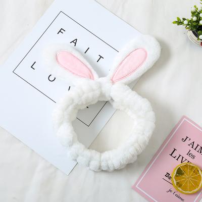 China 2019 Korean soft-push flannel bow rabbit ear wash stereo bundles with cartoon link hair circle headband Tiebudajieshufadai factory wholesale for sale