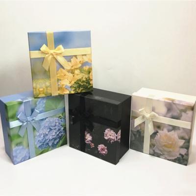 China New Square Lavender Print Garden Recyclable Flower Box Craft Hangcheng Cross Knot Rope For Mother Skin Care Gift Box Black Color Box for sale