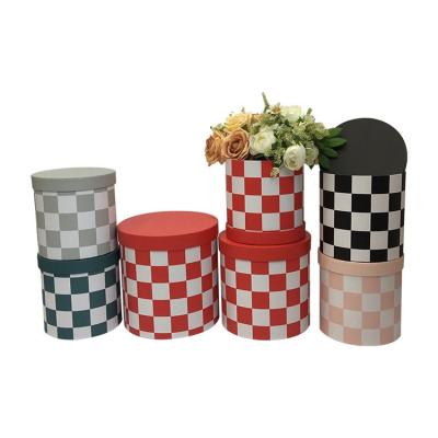 China Recycled Materials Checkerboard Printing Small Box With Round Flowers Pet Paper Bucket Box Simple Celebration Florist Cute Holiday Paper Gift Box for sale