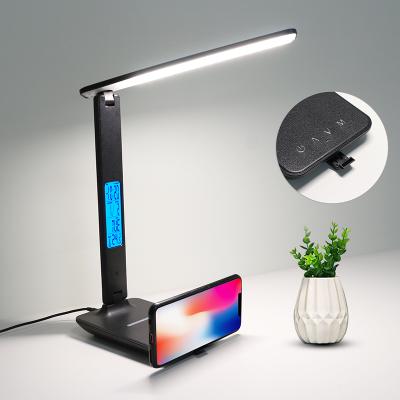 China Modern LED Table Desk Lamp Eye Protect Reading Light With 10W QI Charger Calendar Temperature Wireless Alarm Clock for sale