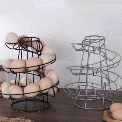 China Sustainable Creative Spiral Frame Household Portable Hanging Egg Kitchen Basket for sale