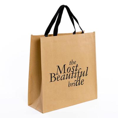 China Eco Friendly Recycled Materials Wholesale Kraft Paper Waterproof Washable Tote Bags With Custom Design for sale