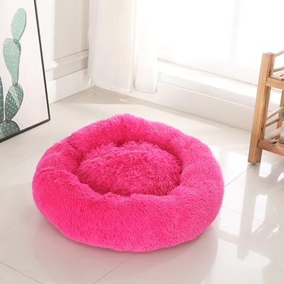 China Breathable Self-Heating Fluffy Non-slip Calming Donut Dog Bed in Washable Shag Fur Pet Plush Bed for sale