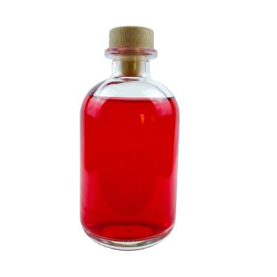 China Wholesale 250Ml 375Ml 500Ml 750Ml 1000Ml Beverage Liquor Wine Bottle Clear Round Glass Bottles With Cork Lid Airtight for sale