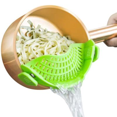 China Dishwasher Safe Kitchen Strainer Sustainable Clip On Silicone Strainer For Pots And Bowls for sale