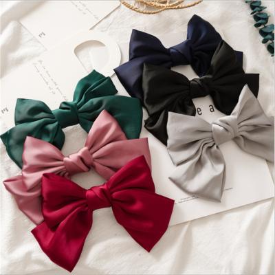 China Fashion South Korea Oversized Bow Hair Clip Ponytail Spring Clip For Girls Girls Accessories for sale