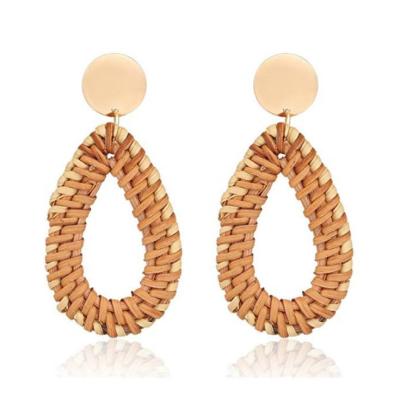 China TRENDY Handmade Style Straw Earrings Tassel Hoop Earrings 2021 Women Popular Geometric Rattan for sale