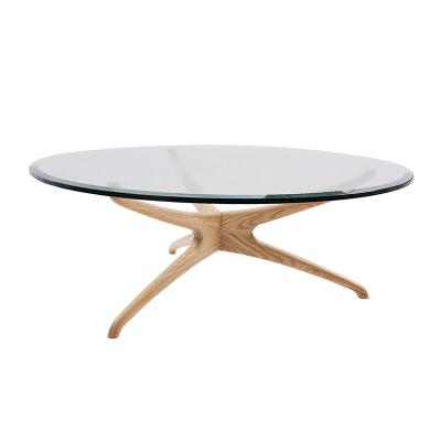 China Modern warm glass starfish solid wood coffee table round glass table for sale