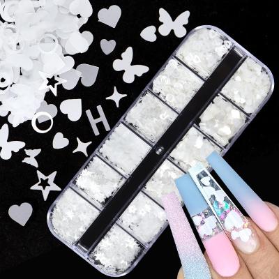 China Different Iridescent Nail Art Decorations Nails Accessories 3D Nail Art Shape Glitter Butterfly Love Letters Decotation Nail Art White DIY for sale