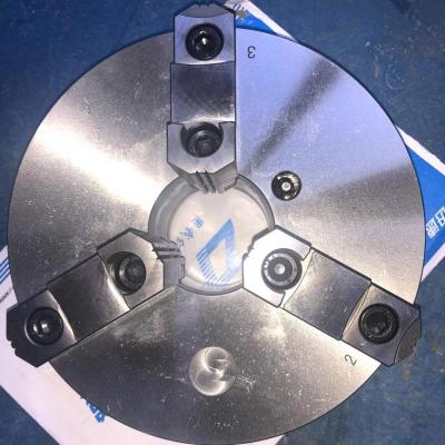 China Custom chuck, LOGO and long life OEM packing. Manufacturers provide OEM high quality three-jaw self-centering manual chuck with oil hole for sale