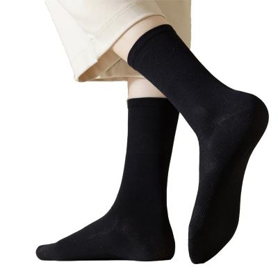 China Sporty ChicCharm Women's Solid Color Mid-Calf Socks: Premium Quality, Vibrant Hues, Everyday Elegance - Shop Our Collection Today! for sale