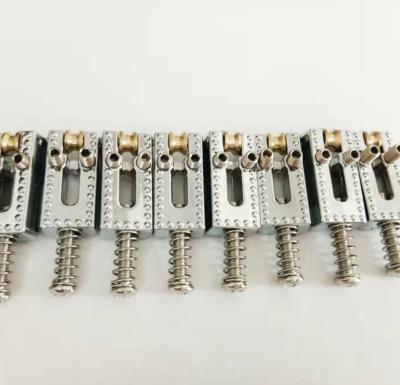 China The Roller Chrome Guitar Bridge Roller Saddle With Spring Screws For Electric Guitar Tremolo Bridge Saddle for sale