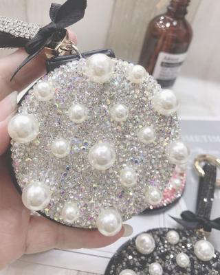 China Round PU Leather Small Mirror Magnifying Key Chains Glitter Cosmetic Mirror Crystal Mini Makeup Mirror for sale