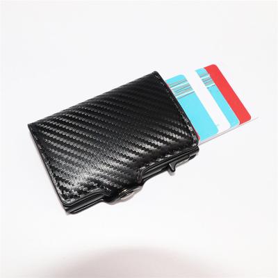 China RFID Blocking Protect Dompet Cuzdan Carbon Fiber Card Wallet With Side Push Card Holder RFID Blocking Function for sale