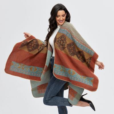 China Artificial wool women's cape shawl 2021 autumn and retro winter warmth faux cashmere scarf split coat for sale