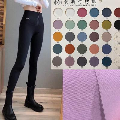 China Fitness Yoga Slim Legs Belly High Stretch Nylon Fabric Shark Skin Bottoming Pants Female Outer Wear Waist High Nine Points Fitness Yoga Barbie Slim Legs Belly tissue for sale