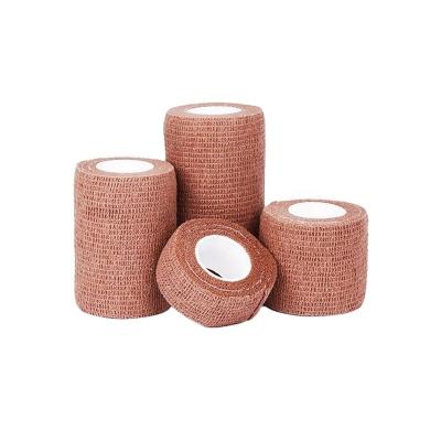 China Brown Color Nonwoven Fabric Cohesive Medical Self Adhesive Bandage Cohesive Elastic Flexible Bandages for sale