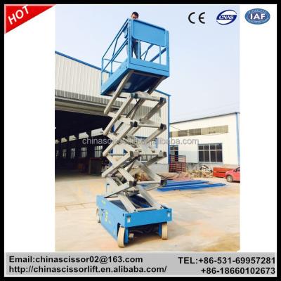 China Battery Powered Scissor Hijack Airplane Outdoor Aerial Work Platform 2.43*1.13m for sale