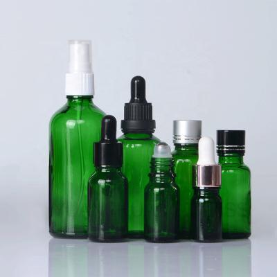 China 5ml 10ml 15ml 20ml 30ml 50ml 100ml Green Essential Oil Glass Cosmetic Dropper Bottle for sale