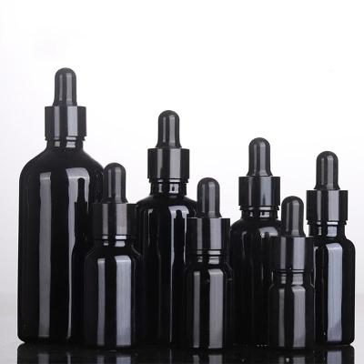 China 5ml 10ml 15ml 20ml 30ml 50ml 100ml Matte Black Essential Oil Glass Cosmetic Bottle With Dropper for sale