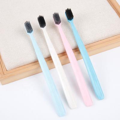 China Eco Friendly Popular Charocal Bristle Toothbrush BPA Free Eco Friendly Cornstarch Extra Soft Handle Toothbrush for sale