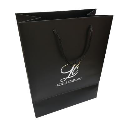 China Recyclable Waterproof Eco Friendly Kraft Bags Tearproof Paper Shopping Bag With Logo for sale