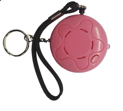 China LED light super loud 130dB pink safety football wholesale women self defense keychain supplies for sale