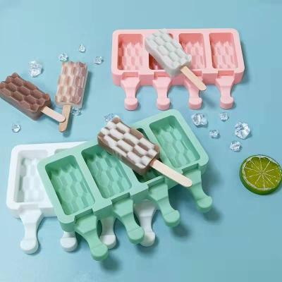 China New DIY Viable Homemade CRH 4 Cavity Ice Cube Mold Paver Shape Ice Cream Mold Silicone Ice Mold With Cover for sale