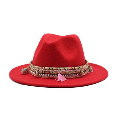 China Ethnic Character Top Hat Style Jazz Hat Fringe Flat Top Bucket Hat Woolen Sports Covers Amazon Hot Selling for sale