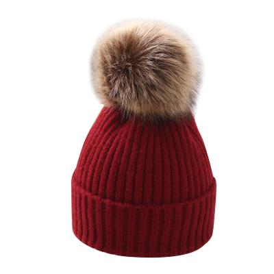 China Casual Knit Logo Custom Leather Patch Winter Beanie Hats With Pompom for sale