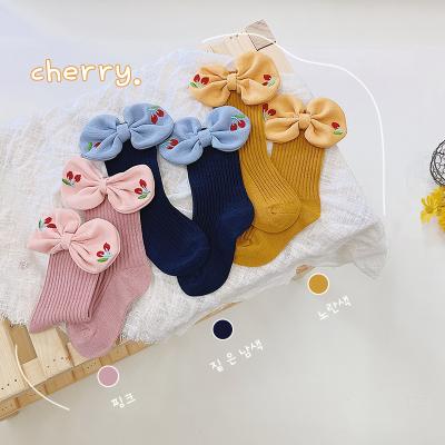 China QUICK DRY multicolor bow tube high socks for girls 2 pairs of small bags 4 bags and 1 medium bag 8 pairs in total for sale