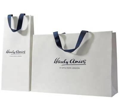 China 2021 Cheap Recycled Custom Logo Kraft Paper Bag Shopping Bag Recyclable Factory Carrier Handbag Bag With Handle for sale