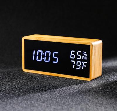 China Whole Running Qualitative Bamboo Electronic DOSSIER Temperature and Humidity Clock Led Digital Pendulum Voice Control Alarm Clock for sale