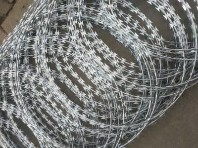 China STAINLESS STEEL WIRE low price high grade concertina coil razor hot dipped galvanized steel wire for sale