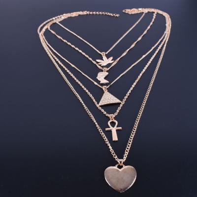 China FASHIONABLE DROPSHIPPING hot sale exaggerated multilayer chain necklace in Europe and America maple leaf portrait pyramid necklace for sale