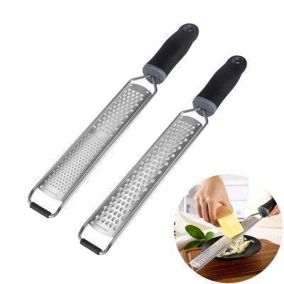 China Kitchen Slicer Cheese Grater Lemon Zester Hand Grater Lemon Stored and Cheese Grater with Non-Slip Grip Handle for sale