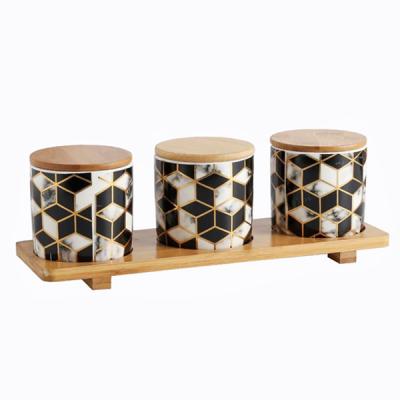 China Creative geometric pattern health and environmental protection sealed storage jar with wooden lid coffee tea candy ceramic jar sealed cans for sale