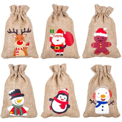 China Eco-Friendly Custom Logo Christmas Burlap Hessian Gift Drawstring Bags For Christmas Party Wedding Supplies for sale