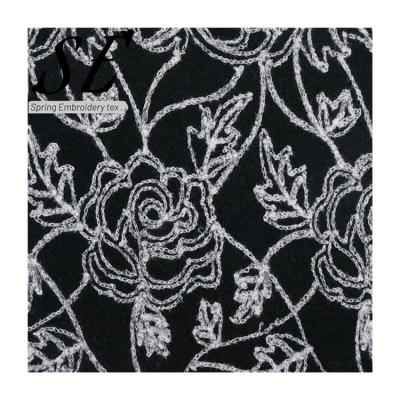 China Other wholesale price cheap black embroidery lace tying designs tape embroidery fabric for sale