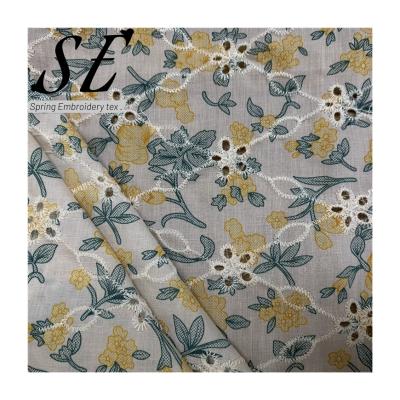 China Breathable Dyed Floral Luxury Fabric Eyelet Embroidery Fabric For Woman Dress Baby Kids Clothes A007 for sale