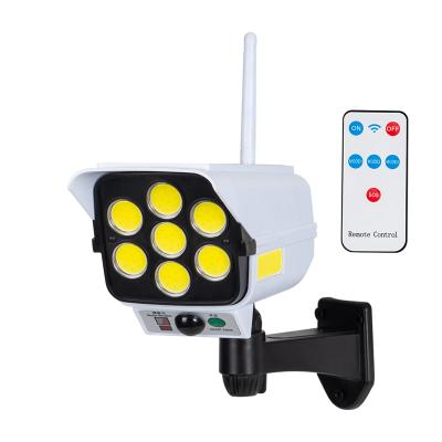 China Waterproof Garden Solar Power Simulation Surveillance Camera Wall Light Garden Light for sale