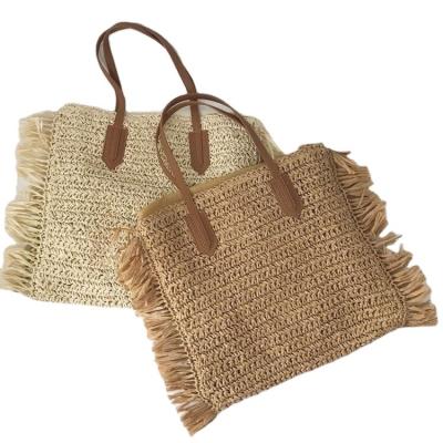 China pp exported to Europe and America, simple large capacity tassel handbags are beach handwoven bags, straw bags and seaside summer h for sale