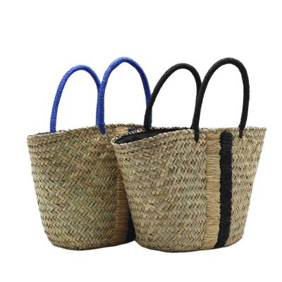 China Nonwoven fabric fashion chaoliu women's dress grass straw bag portable blue and black woven bag for sale