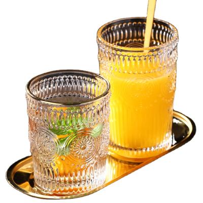 China Wholesale Artistic Flower Cut Water Drinking Glass Cup For Cold Water Juice Cup Drinking Glass Cut Out for sale